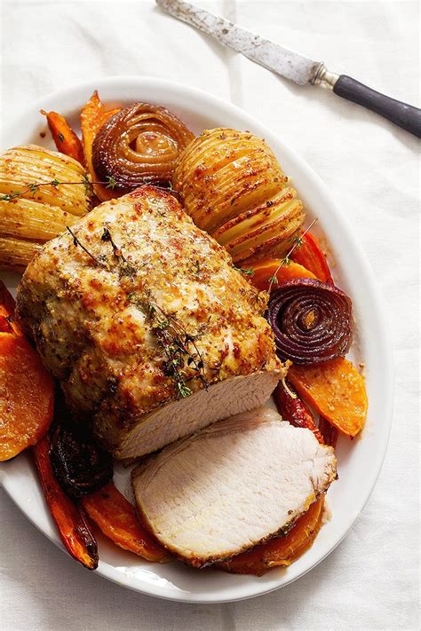 Push sweet potatoes and onions to the sides of the sheet pan, placing the pork tenderloins in the center. 11 Main Dishes to Take Your Holiday Dinner Up a Notch ...