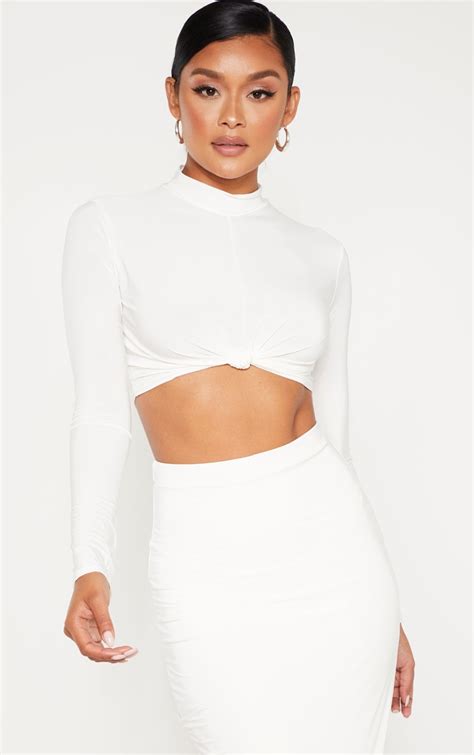 Cream Slinky High Neck Knot Long Sleeve Crop Top Prettylittlething
