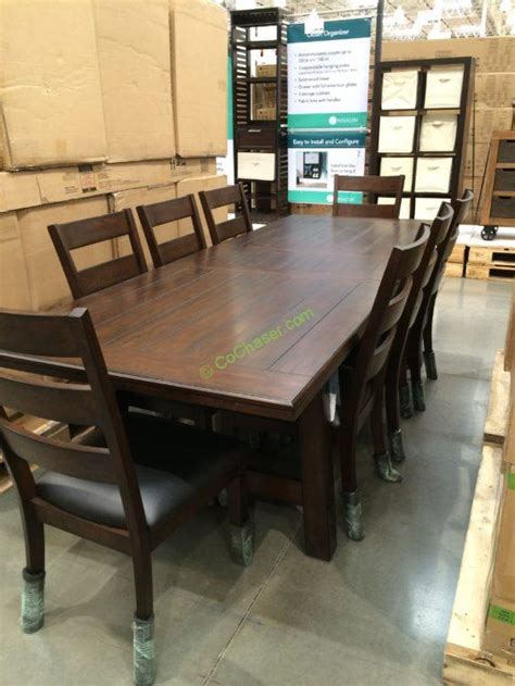 This seven piece costco dining room set is costco item number 1550399 and includes a 78″ table (without leaf) and six upholstered chairs for $1,999.99 including delivery, setup and packaging removal. Bayside Furnishings 9PC Dining Set - CostcoChaser