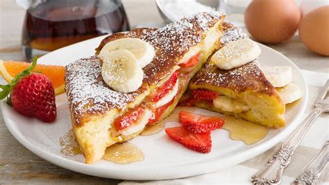 Heat the oil in a griddle or frying pan over medium heat. Stuffed French Toast with Strawberries and Banana | Get ...