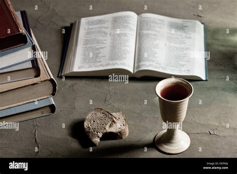 Chalice Of Wine With Bread And Bible Stock Photo Alamy