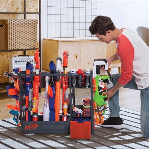 This diy nerf gun wall was seriously so easy (special thanks to my super handy husband for helping all my visions work) and i wish we would've done this long ago. Nerf Gun Display Rack Diy / Easy Diy Nerf Gun Storage From ...