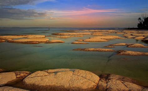 It's landforms of igneous and metamorphic rocks, karst limestone in the west. Hotel near Jamaica beach Sirmione, the free beach on the ...