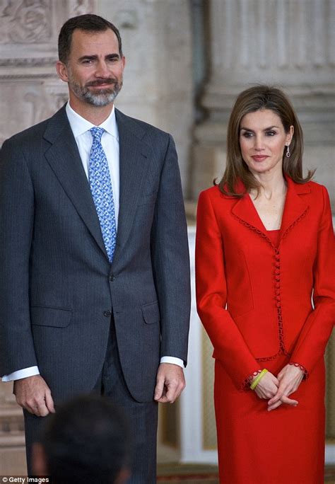 Queen Letizia Stylish In Scarlet At Awards Ceremony With King Felipe In