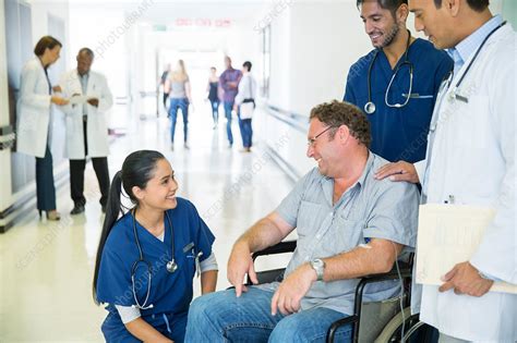 Doctor And Nurses Talking To Patient Stock Image F0147481