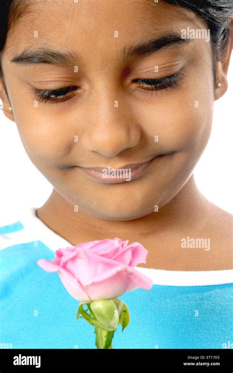 Girl Holding Pink Rose Hi Res Stock Photography And Images Alamy