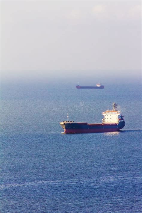 Cargo Merchant Ship Sailing In The Ocean Sea Stock Photo Image Of