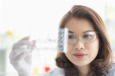 Scientist Holding Test Tube Tray In Her Hand Stock Photo Image Of