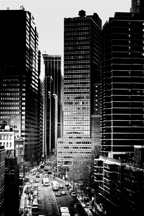 Download Wallpaper 800x1200 Road Cars Buildings Skyscrapers City