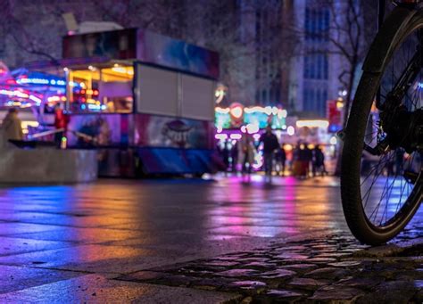 premium photo bicycle parked on street at night