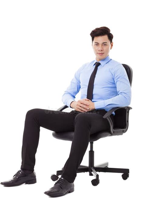 Young Businessman Sitting In A Chair Isolated Stock Image Image Of