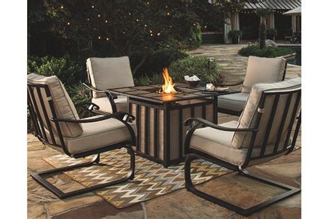 Gather Round The Flickering Warmth Of The Wandon Fire Pit Table The Square Tabletop Is Neatly