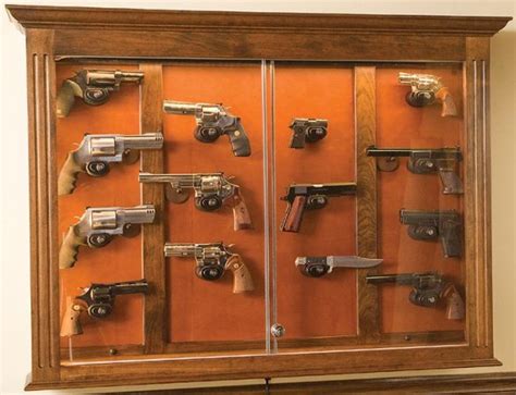I wanted to have a place to secure my firearms that wasn't visible all the time, so i came up with the idea of a recessed in the wall gun cabinet that doubles as a full body mirror. The Woodloft - Illinois Amish Custom Crafted Pistol Display