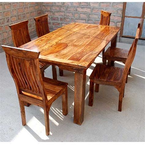 Start with a rustic farmhouse table complete with raw wood grain and distressing, and add variety seating to the mix. Dallas Ranch Solid Wood Rustic Dining Table Chairs & Hutch Set