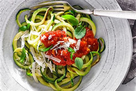 Peel zucchini into long ribbons; Zucchini Noodles with Tomato Butter Sauce made using the ...