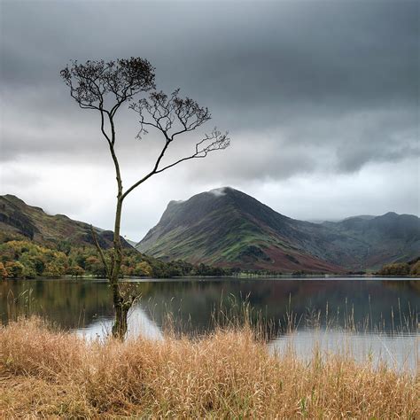 Stuning Autumn Fall Landscape Image Of Lake Buttermere In Lake D