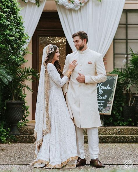 spotted stunning couples in white outfits on their wedding day