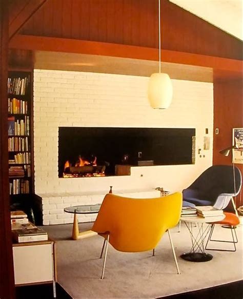 See our new takes on the classic fireplace. Larsen Interiors, LLC: Traditional vs Mid Century Modern Fireplace when Decorating your Living Room