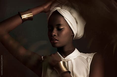 African Woman With A White Turban By Lumina Stocksy United