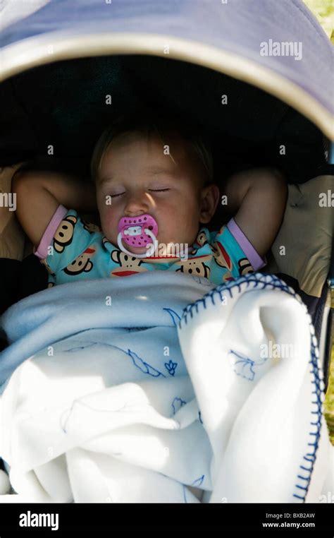 Baby Asleep Pram Hi Res Stock Photography And Images Alamy