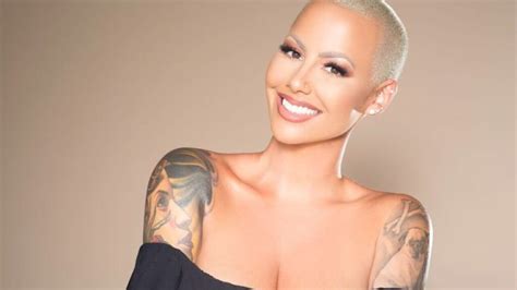 Following her divorce from wiz khalifa, amber rose tweaked the cam tattoo on her right thumb to say pain. cam was for the rappers's legal name cameron jibril thomaz. Amber Rose Gets Forehead Tattoo And Fans Freak Out That ...