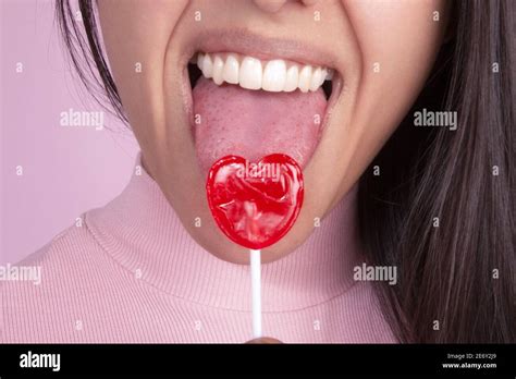 Womans Mouth Smiling Showing Teeth And Sticking Out Her Tongue Licking