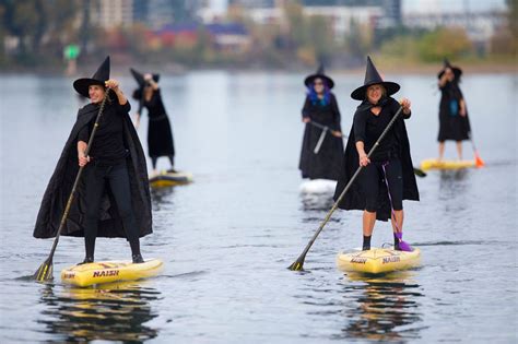 Sup Witches See The First Coven Of Witches Stand Up Paddle On The Cuyahoga River
