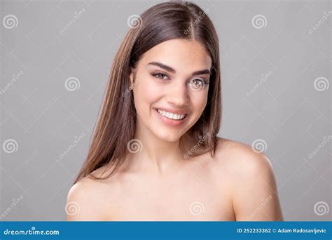 Beautiful Young Woman With Perfect Skin And Open Smile Portrait Of