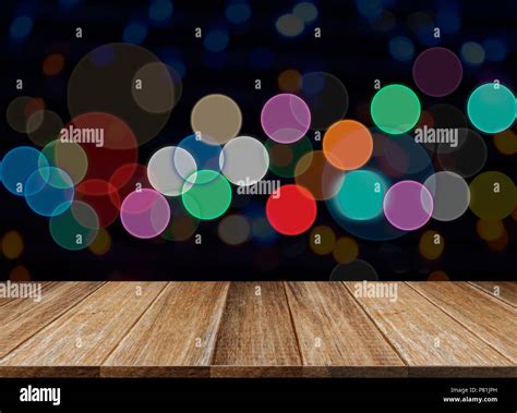 Celebration Background Of Wood Table Top On Colorful Light Bokeh Stock