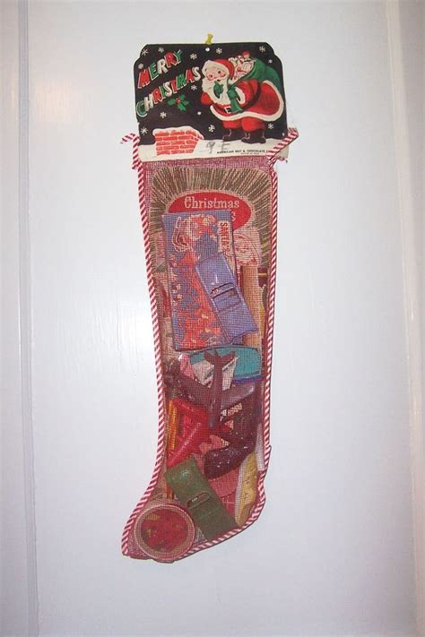 Candy funhouse wants to make sure your stockings are hung with care! 1950's Vintage Mesh Christmas Stocking Toys Games Filled Unopened | Vintage christmas stockings ...