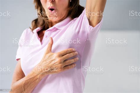 Woman Sweating Very Badly Under Armpit Stock Photo Download Image Now
