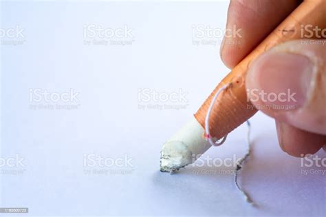 Womans Right Hand Holding Dermatograph Pencil Writing Letter On White