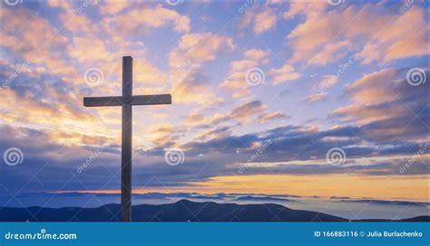 Cross On A Mountain Top With Beautiful Sunset Sky Stock Photo Image