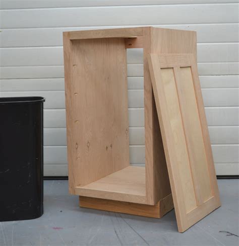 Using the board planning sheet, cut the 2×4 boards to create the structural framing for the center and side walls.to ensure the lengths of like parts are equal, use the first cut of each group to mark each subsequent cut. Ana White | 18" Kitchen Base Cabinet Trash Pull Out or Storage Cupboard with Door - DIY Projects