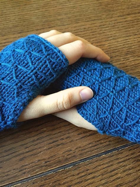 Knitted wrist warmers help keep hands and wrists toasty warm. Lattice Knit Wrist Warmers · How To Stitch A Knit Or ...