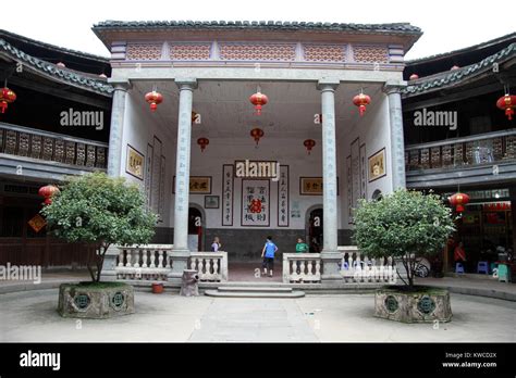 Temple Inside Big Stone Tulou In Chinese Village Stock Photo Alamy