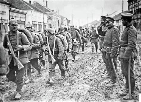 German Soldiers Marching Through The Serbian Town Of Paracin During