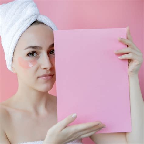 Premium Photo Portrait Of Beauty Woman With Eye Patches On Pink Background Woman Beauty Face