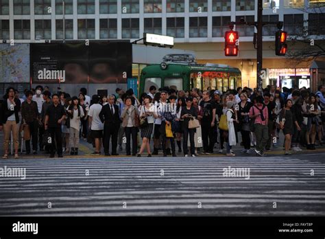 A Crowded Pedestrian Crossing In Shibuya Tokyo Japan Stock Photo Alamy