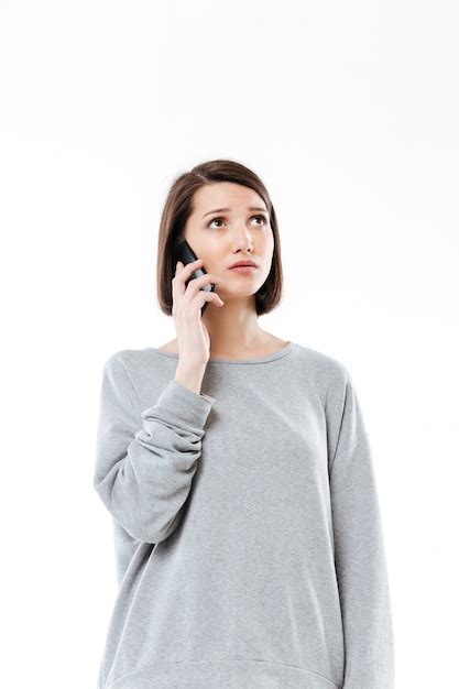 Free Photo Sad Young Caucasian Woman Talking By Phone