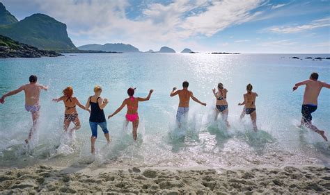 Group Of People Playing On Beach Photo Free Beach Image On Unsplash