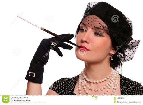 Portrait Of A Woman With A Cigarette Holder Stock Images