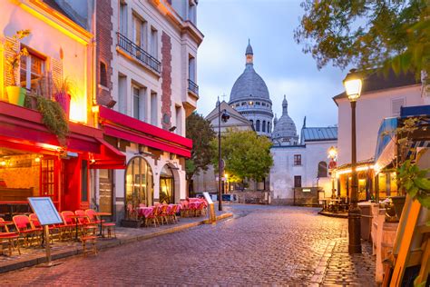 The Place Du Tertre With Tables Of Cafe And The Sacre Coeur In The