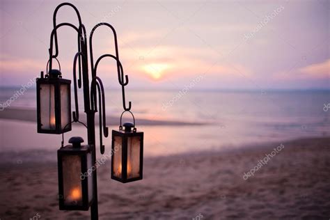 Lantern On The Beach In Sunset — Stock Photo © April89 26319385