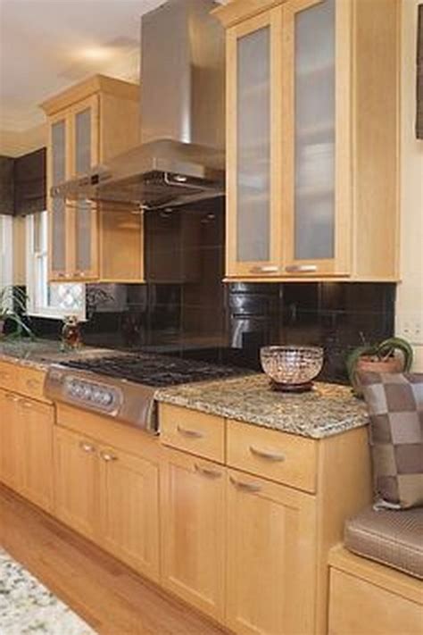 We have maple cabinets and, like yours, our kitchen is in the interior of the house (with views of windows, but no windows in the kitchen). ️ 86 Ideas For Backsplash For Black Granite Countertops And Maple Cabinets Are Most Interest ...