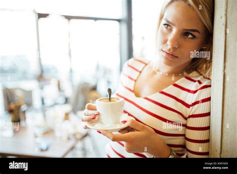 Portrait Of A Beautiful Woman Drinking Coffee Stock Photo Alamy