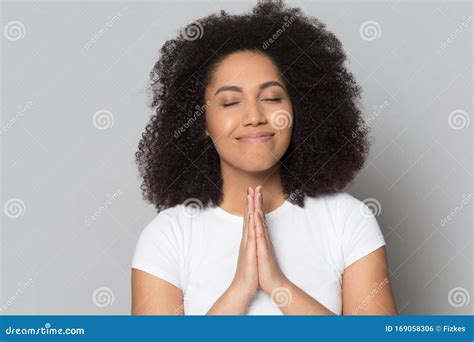 Mindful Hopeful African American Millennial Woman Praying Asking For
