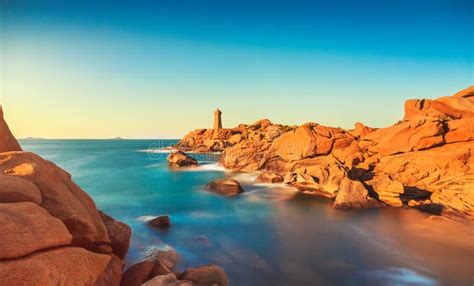 Ploumanach Lighthouse Sunset In Pink Granite Coast Brittany Fr Stock