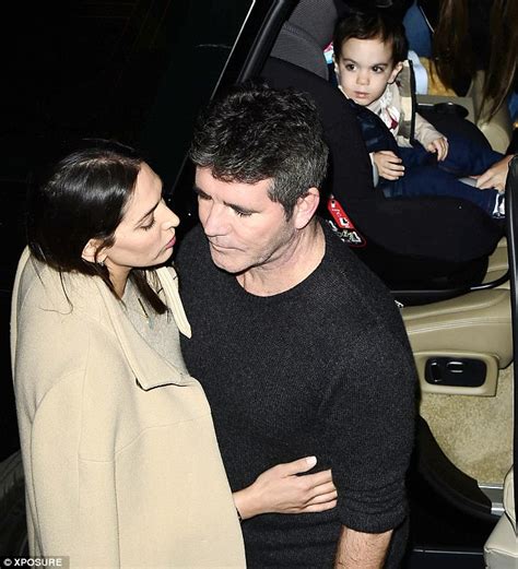 simon cowell kisses lauren silverman as look a like son eric watches daily mail online