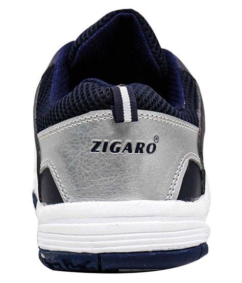 Regular running shoes or any other kind of sneakers will not be able to support your feet while you're playing. Zigaro Navy Badminton Shoes - Buy Zigaro Navy Badminton ...